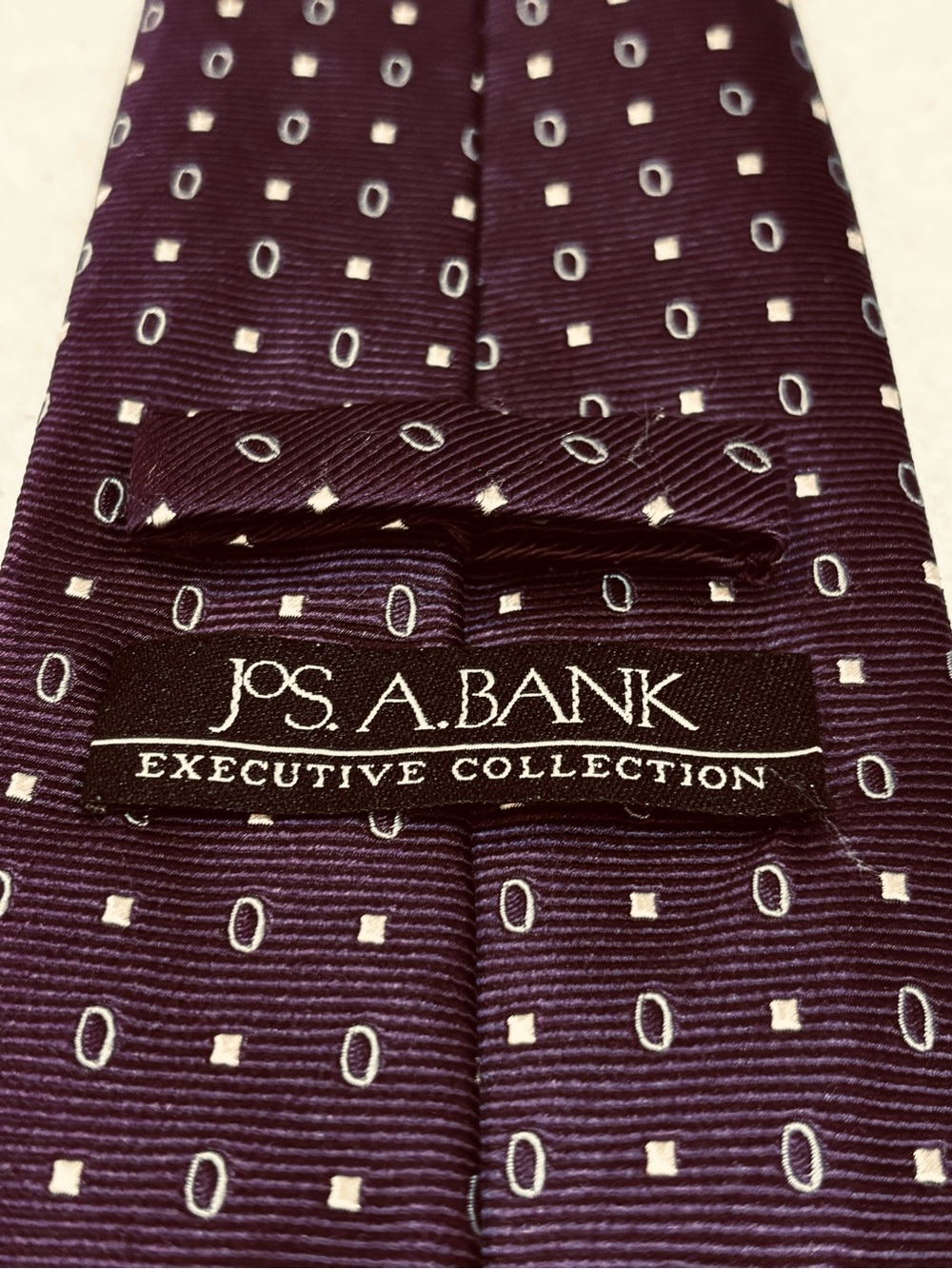 Jos. A. Bank Purple Tie with Ivory Dots and Ovals - Picture 4 of 4